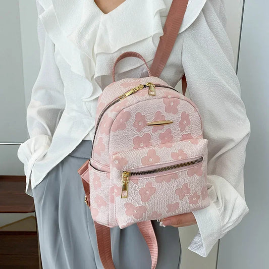 Flor com estilo: Mini mochila multifuncional de ombro em couro puro.